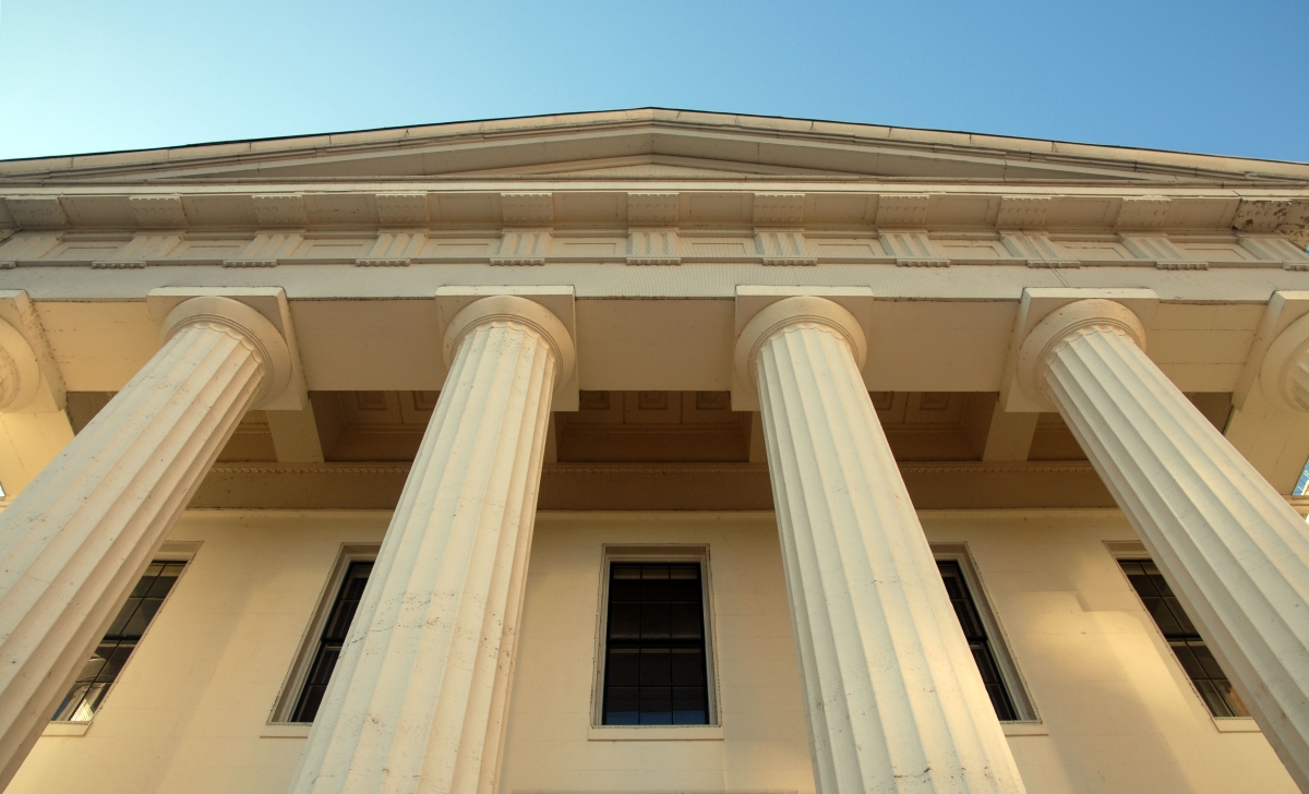(Image) The pillars of a courthouse.