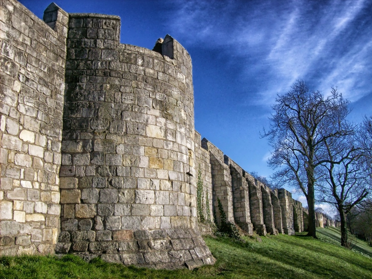 Image: The tall walls of a castle.