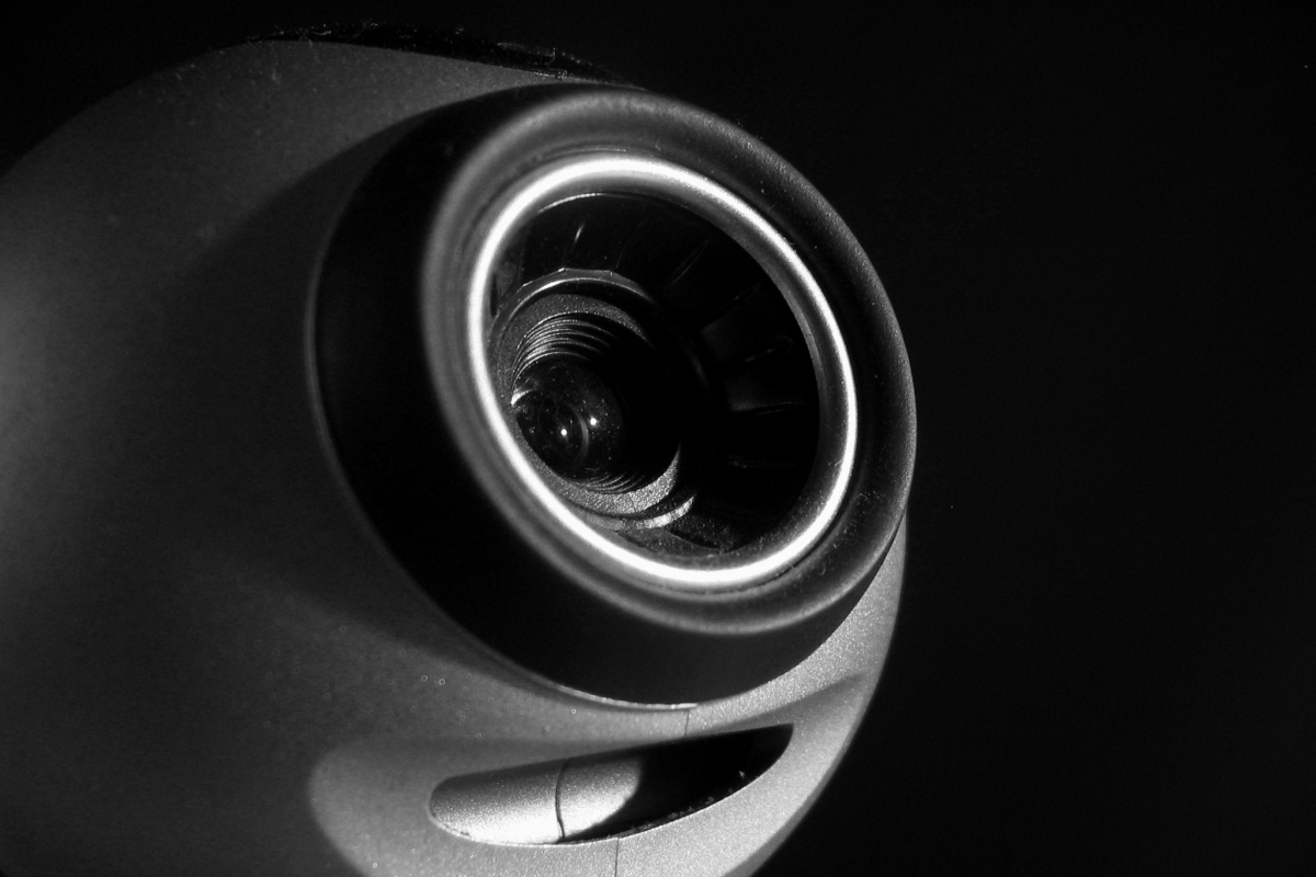 Close-up of the lens of a webcam.
